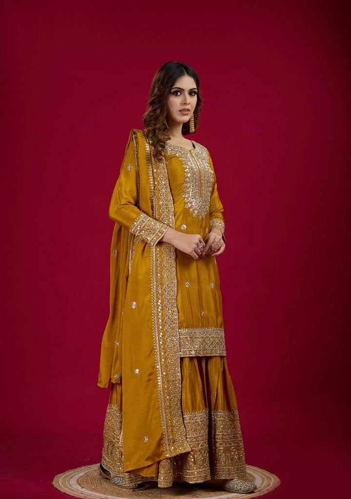 Embroidered Chenderi Mustard Stitched Suit - Indya